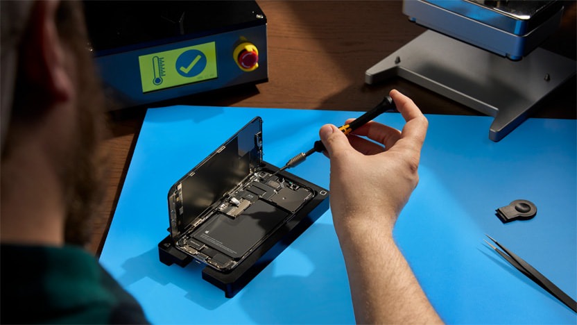Professional mobile repair technician fixing a phone in Nottingham